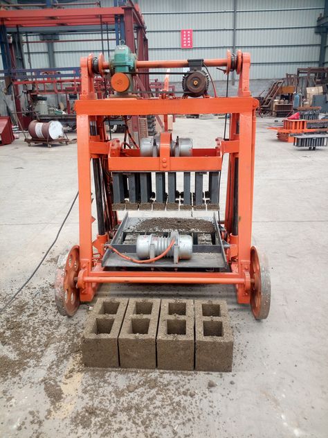 QT40-3B is a mobile concrete block making machine .It mainly making hollow and solid blocks by changing molds.Easy in operating and safe in controling.It wins great reputation from our clinets.  Welcome contact me for more information. Mobile/Whatsapp:+86 155 5484 6886 Skype:Carina90580 Email:carina@yingchengchina.com Clay Block, Fly Ash Bricks, Block Making Machine, Home Window Grill Design, Earth Bag Homes, Interlocking Bricks, Mechanical Engineering Design, Brick Molding, Concrete Diy Projects