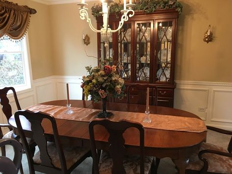 Traditional Queen Anne Dining Table and cherry wood china cabinet. Learn how I purchased all of this for very little money! #diningroomdecor, #diningroomideas, #diningroom, #diningroomtable, #chinacabinet display, #chinacabinet #furniture, #buyingfurnitureonabudget, #buyingfurniturefirsthome, #buyingfurnituretips, #furnitureonabudget Queen Anne Dining Table, Furniture On A Budget, One Bedroom Apartments, Brown Leather Furniture, Tuscan Furniture, My First Home, Empty House, One Bedroom Flat, Modern Farmhouse Home Decor