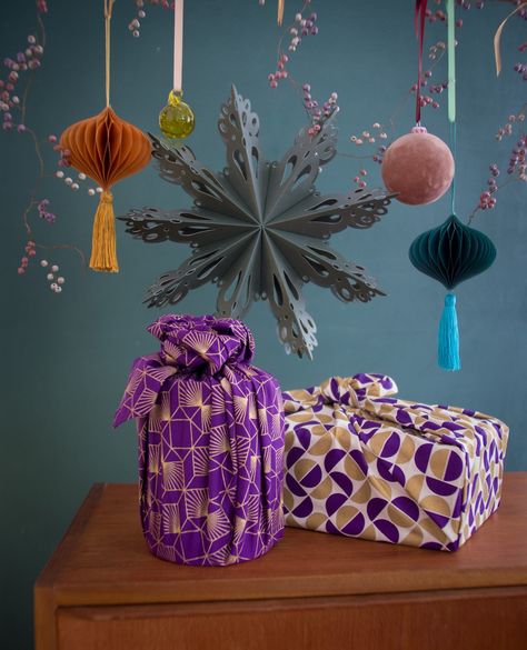 One thing about our exclusive FabRap designs - they will light up any room. With shimmering golden accents, our furoshiki look great on any gift table or underneath the Christmas tree. ⭐️⁠ ⁠ Furoshiki Cloth, Fabric Gift Wrapping, Minimalist Lifestyle Inspiration, Reusable Gift Wrap, Sustainable Christmas, Fabric Gift Wrap, Wooden Snowflakes, Gift Table, Gold Moon