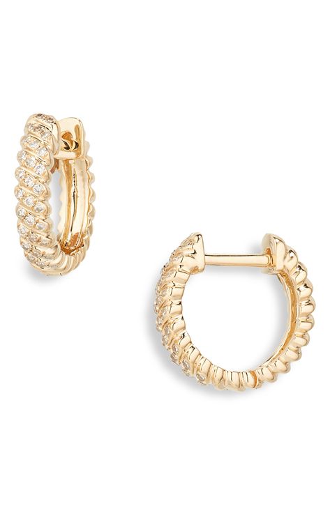 Ribbons of diamond pavé wrap around these huggie hoop earrings crafted from 14-karat gold. 1/2" hoop diameter; 1/8" width Hinge with snap-post closure Total diamond weight: 0.12ct. Color: G–H Clarity: SI1–SI2 14k gold/diamond Imported >Diamond Guide Diamond Guide, Earring Crafts, Huggie Hoop Earrings, G H, Cute Earrings, Cute Jewelry, Pave Diamonds, Wrap Around, Gold Diamond