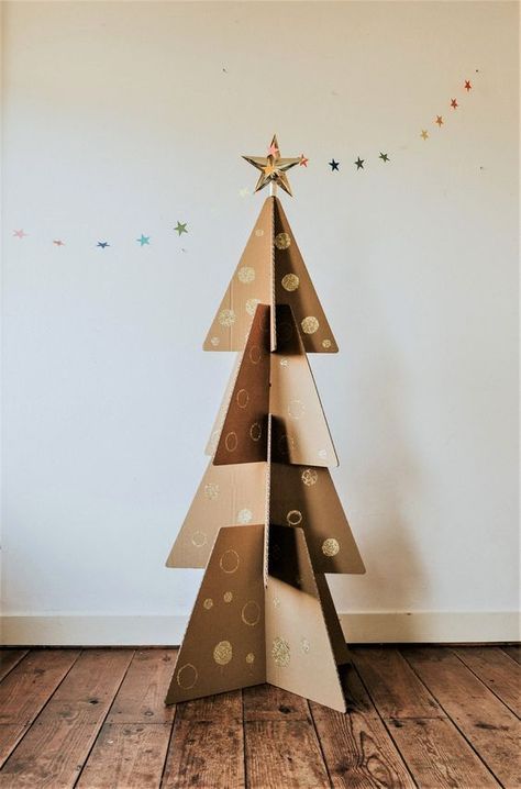 60 Creative Christmas Tree Ideas: Get Inspired and Festive this Holiday Season! Creative Christmas Tree Ideas, Turquoise Christmas Tree, Recycled Christmas Tree, Cardboard Christmas Tree, Cardboard Christmas, Big Christmas Tree, Pallet Christmas Tree, Christmas Props, Creative Christmas Trees