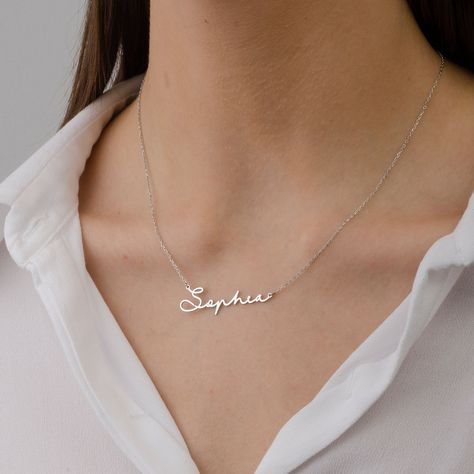 "♥Name Necklace ♥ * Material: High Quality Solid 925 Sterling Silver * Finish: Sterling Silver ∙ 18K Gold ∙ Rose Gold * All our jewelry is made by hand with Love STERLING SILVER 925 ♥ We use real Sterling Silver 925 ♥ ♥ How to customize Order? ♥ 1) Select Color 2) Select Chain length 3) Click \"Add to Cart\" 3) Will need work name or letters write to the text box (like: Alis ♥ Laura -S♥G ) 4) Checkout 5) Complete order ♥ Shipping & Package ♥ * Your order will be shipped within 5 days (on bus Name Chain Silver Design, Silver Necklace With Name, Cursive Name Necklace, Custom Silver Necklaces, Silver Chain For Women Unique, Simple Necklace Designs, Silver Name Necklace, Name Necklace Silver, Handwriting Necklace