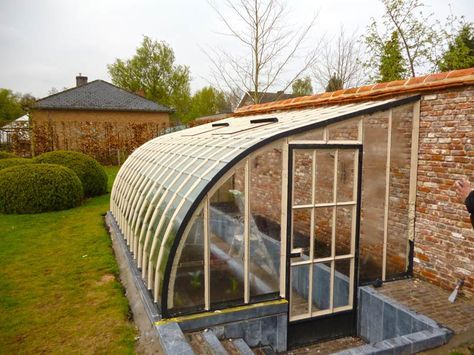 A lean-to greenhouse design by DBG Classics can be constructed in several ways. This garden conservatory is a custom-made, recessed model in wrought iron, built against the client's garden wall. Alongside the interior path, there is a miniature greenhouse left and right for vegetables, fruit, and herbs. A recessed lean-to greenhouse design can be ideal in certain gardens with Serre Diy, Green House Architecture, Miniature Greenhouse, Green House Design, Lean To Greenhouse, Greenhouse Design, Polycarbonate Greenhouse, Lean To, Greenhouse Interiors