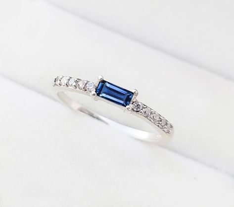 925 Sterling Silver Fashion Jewelry Beautiful Blue Sapphire Ring, This Ring is perfect gift for special love one. Sapphire is a very popular gemstone in Today's Fashion. M A T E R I A L S: * 925 Sterling Silver * Lab Created Sapphire * Main Stone Baguette 5x2.5 mm * Accented with tiny Cubic Zircon * Comes in our beautiful handmade gift box This simple and cute Baguette Sapphire Ring. Amazingly young look for daily casual wear. Beautifully craft handmade silver ring. Free Shipping! Occasion:  Par Beautiful Promise Rings, Blue Sapphire Wedding Ring, Sterling Silver Cz Rings, Feminine Jewelry, Stackable Rings Silver, Moissanite Engagement Ring Oval, Cz Rings Engagement, Engagement Ring Shapes, Wedding Rings Solitaire