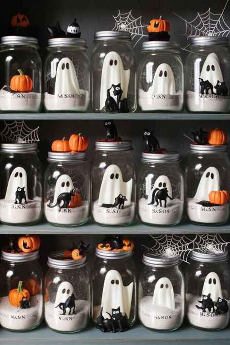 25 DIY Ghost Decoration [Within Budget] – craftydiyers.com Ghost Peeps In Jar, Ghost Table Centerpiece, Mason Jar Diorama, Diy Mini Ghosts, Halloween Jar Crafts, Diy Ghost In A Jar, Pet Ghost In A Jar Diy, Ghost Crafts For Adults, Ghost In A Jar Diy