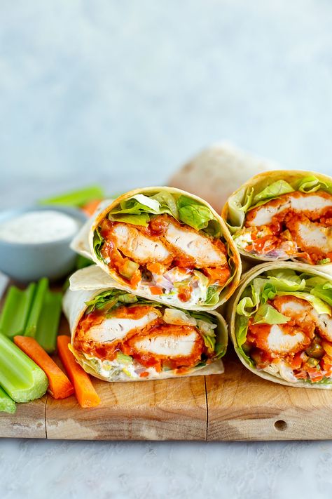 This is truly the BEST Buffalo Chicken Wrap you'll ever eat, with the crispiest baked chicken tenders coated in sauce. It's my fave lunch! Best Buffalo Chicken Wraps, Crunchy Chicken Wraps, Buffalo Chicken Wraps Meal Prep, Buffalo Wraps Chicken, Chicken Wrap Sandwiches, Chicken Tender Wraps Recipes, Buffalo Chicken Wraps Air Fryer, Best Wraps For Lunch, Chicken Buffalo Wrap