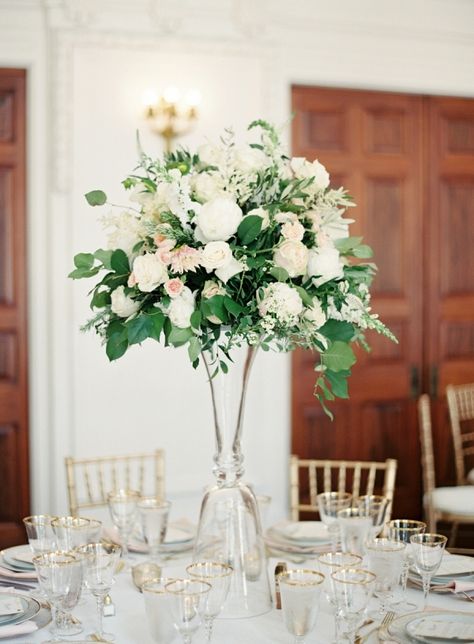 Tall floral centerpieces that wow: http://www.stylemepretty.com/2016/02/10/trending-high-centerpieces-thatll-wow-your-guests/ Cheap Wedding Table Centerpieces, Tall Centerpiece, Elegant Wedding Centerpiece, Tall Wedding Centerpieces, Unique Wedding Flowers, Wedding Floral Centerpieces, Tall Centerpieces, Wedding Table Flowers, Tall Vase