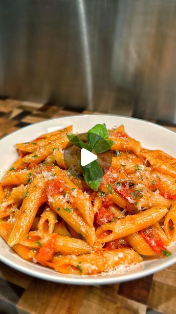 Notorious Foodie on Instagram: "Home Cooking Sessions: Penne All’Arrabbiata. A simple tomato based pasta with a kick. Full recipe below 👇🏽🤤
-
1. Slice 300g of piccobella tomatoes into halves along with 1 red chilli and 2 cloves of garlic 
2. Lace a cold pan with EV olive oil and add in your garlic, chilli, peperoncino and a bunch of basil - then turn up the heat to med-high
3. Let this all fry and infuse for 2-3 mins, then add in your tomatoes and season with sea salt and black pepper
4. Cook for 2 mins then cover with a lid and reduce the heat a little to continue cooking for 5-6 mins
5. Meanwhile boil some penne in salted water
6. Remove the lid and fish out the basil + chilli, then gently crush the tomatoes to desired consistency and add in your al dente penne with some pasta water a Tomato Based Pasta, Notorious Foodie, Pasta Water, Tomato Pasta, Penne Pasta, Red Chilli, Black Pepper, Sea Salt, Home Cooking