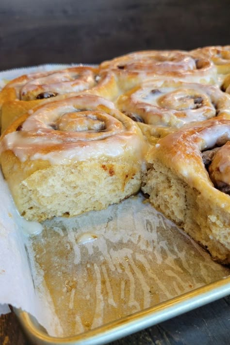 A baking sheet close up of fresh hot cinnamon rolls, one is missing, showing the light & fluffy sides of the remaining cinnamon rolls Connamon Rolls, Whole Wheat Cinnamon Rolls, Wheat Cinnamon Rolls, Cinnamon Rolls With Icing, Wheat Berry Recipes, Fresh Milled Flour, Sourdough Cinnamon Rolls, Fresh Dates, Wheat Recipes