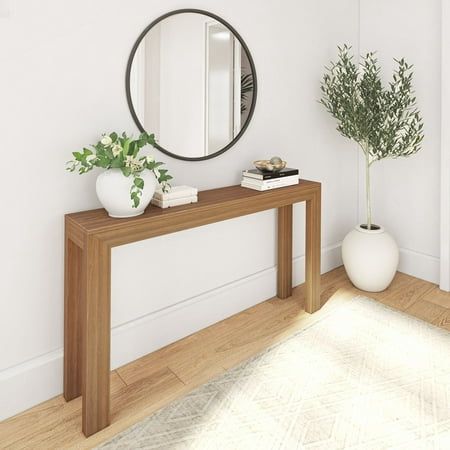 Add a touch of style to any room with the Plank+Beam Modern Console Table, featuring sleek and minimalist design. The perfect combination of modern style and quality craftsmanship, this long console table has a strong and sturdy design that complements any space. Knot-free, solid pine wood construction provides superior strength and durability, while non-toxic, low-VOC finishes create a clean and healthy home. Stylish and versatile, this console table is the ideal accent piece for your living ro Narrow Hall Tables, Long Narrow Console Table, Narrow Console Table Entryway, Console Table Behind Couch, Narrow Hall Table, Chic Console Table, Foyer Tables, Modern Console Table Entryway, Couch Console