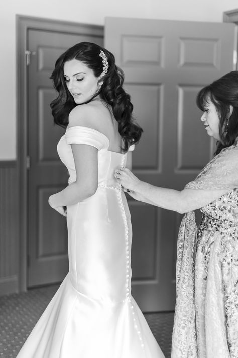 Getting ready on the morning of your wedding day and having your mom help you put on your wedding dress is such a special moment. This black and white photograph in Saratoga Springs of a mother helping her daughter button up her wedding dress is so special. Mom And Daughter Getting Ready Wedding, Mother Helping Bride Get Ready, Brides Mom, Getting Ready Wedding, Photos Poses, Wedding Pic, Black And White Photograph, Future Wedding Plans, Wedding Photos Poses