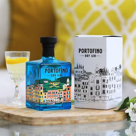 Born from a desire to bring the spirit of the Italian Riviera to the World, the design was inspired by Portofino’s picturesque harbour, where colourful houses and green hills decorate the landscape between the sky and the sea. If you collect three bottles, you'll recreate the scenery in your own home... Whiskey Bottle Labels, Whiskey Packaging, Cookies Branding, Beer Graphic, Gin Brands, Wine Bottle Design, Italian Riviera, Cosmetic Packaging Design, Perfume Packaging