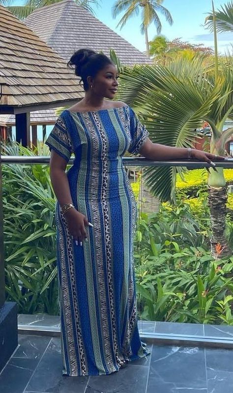 Long Flay Ankara Gown Styles 2024 - Gist94 Adire Outfits For Ladies, Flay Ankara Gown Styles, Flay Ankara Gown, Long Flay Gown, Flay Gown Styles, Gown Styles For Ladies, Modest Dresses Fashion, Long African Dresses, Ankara Dress Styles