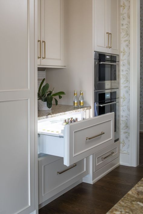 Paneled refrigerator drawer in custom kitchen design keeps the cabinetry and kitchen design seamless. Keep beverages chilled for easy access. #beveragecenter #refrigeratordrawer #kitchenideas #luxuryliving Drink Drawer, Drawer In Kitchen, Paneled Refrigerator, Custom Refrigerator, Kitchen Cabinetry Design, Home Wet Bar, Beverage Station, Custom Kitchens Design, Refrigerator Drawers