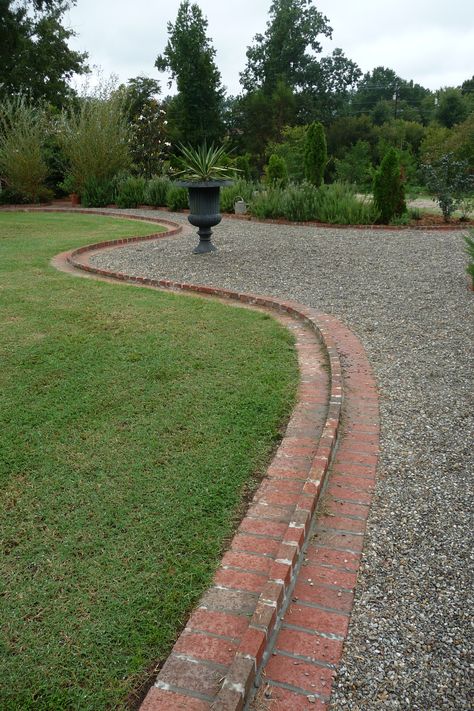 This was my favorite gravel with the Brick border. Kyle also mentioned it would be good since it was also small. Gravel Driveway With Brick Edging, Driveway Brick Edging, Brick And Gravel Driveway, Brick And Gravel Walkway, Driveway Edging Ideas, Gravel Driveway Edging, Driveway Edging, Fence Border, Brick Border