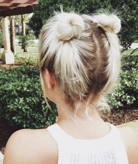 The perfect look for carefree, sunny days, twin topknots add a dose of fun to your everyday style. Motorcycle Hairstyles, Popular Short Hairstyles, Short Hair Bun, Cute Hairstyles For Short Hair, Haircut For Thick Hair, Short Hairstyle, Short Haircut, Trending Hairstyles, Girl Short Hair