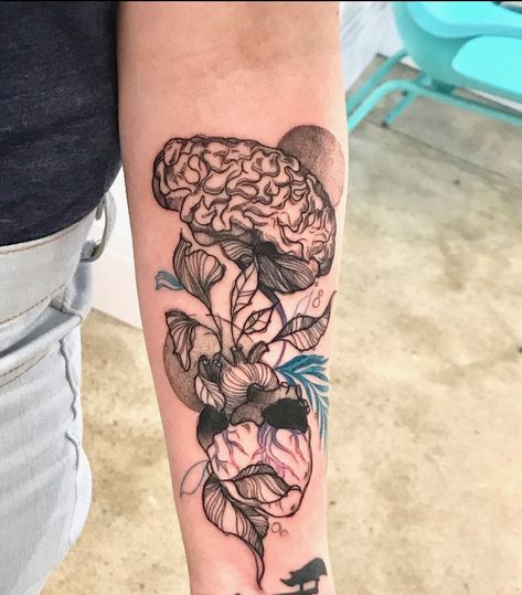 Brain tattoo with brainstem turning into heart obscured by exotic leaves and flowers. Done by Karolina Skulska ( Insta: @skvlska ). I wanted the brain to be the focus. Love how the artist captured that. The heart and forestry also remind me a little of Temple of Doom and Heart of Darkness Brain And Butterfly Tattoo, Nature Heart Tattoo, Flower Brain Tattoos, Sci Fi Tattoos, Shawn Roberts, Brain Tattoos, Bloom Tattoo, Anatomy Tattoo, Valkyrie Tattoo