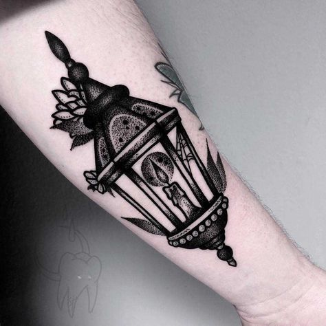 Blackwork lantern tattoo on the left forearm Lantern Tattoo Design, Gotik Tattoo, Sky Tattoos, Backpiece Tattoo, Tattoo Black And White, Lantern Tattoo, Neotraditional Tattoo, White Lantern, Goth Tattoo