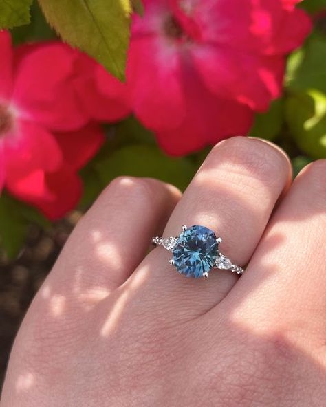 Earth’s Treasury on Instagram: "Glittering diamonds compliment the 3.87-Carat Sky-Aqua Blue Particolored Montana Sapphire (Heated) set into this Carina Ring, an ideal option for someone who wants their gemstone set as low as possible without sacrificing style and sparkle. #FindYourColor #MontanaSapphires #PrecisionCutSapphires #EthicalGemstones #MinedintheUS #AmericanGemstones #AmericanSapphires #CustomFineJewelry #MontanaSapphireRing #MontanaSapphireEngagementRing #ThreeStoneRing #Sapphireand Blue Montana Sapphire Engagement Ring, Montana Blue Sapphire Engagement Ring, Montana Yogo Sapphire Engagement Ring, Montana Sapphire Earrings, Montana Sapphire Necklace, Montana Sapphire Engagement, Montana Sapphire Engagement Ring, Montana Sapphire Ring, Montana Sapphire