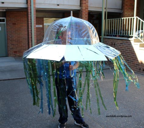 Here’s our costume for this year’s Book Week parade…our last one! Ufo Costume, Kids Alien Costume, Space Party Costumes, Diy Alien Costume, Cardboard Kids, Nye 2024, Alien Halloween Costume, Cardboard Construction, Space Costumes