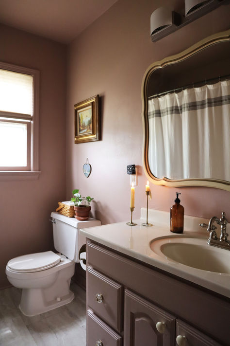 Bathroom vanity makeover in mauve color and cream counter Mauve Paint, Mauve Bathroom, Mauve Paint Colors, How To Install Baseboards, Easy Bathroom Updates, Mauve Walls, Toilet Handle, Big Baths, 1940s Home