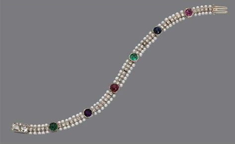 COLORED STONE, DIAMOND AND SEED PEARL "DEAREST" BRACELET, RAYMOND YARD, CIRCA 1910 Set at intervals with faceted and cabochon colored stones and diamonds, including 2 rose-cut diamonds, an emerald, an amethyst, a ruby, an emerald, a sapphire and a tourmaline, the first letter of each stone spelling "dearest", joined by segments of small old European-cut diamonds within seed pearl borders, mounted in platinum, length 7 ¾ inches, signed Yard, Inc. Edwardian Art, Bracelet Pearl, Precious Gemstones Jewelry, Gemstone Beaded Necklace, Colored Stones, Colored Stone, Ruby Sapphire, Sapphire Bracelet, Royal Jewelry