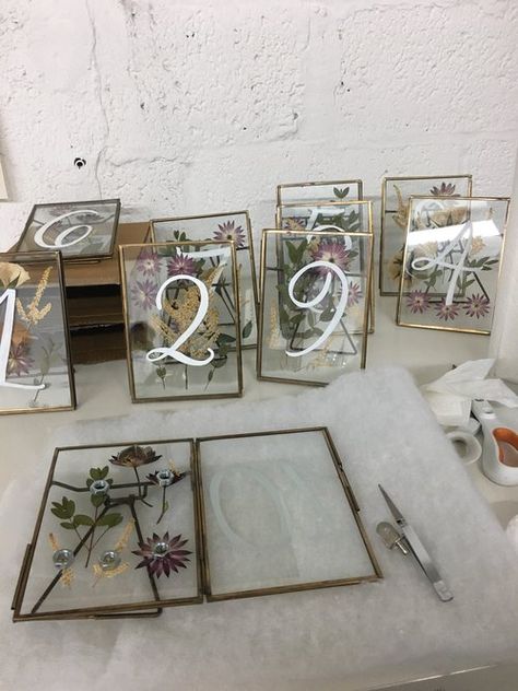 Pressed Flower Table Numbers, Pressed Flower Table, Framed Florals, Creative Wedding Table Numbers, Wedding Table Number Ideas, Brooklyn Bar, Table Number Ideas, Flower Table Numbers, Hand Yoga