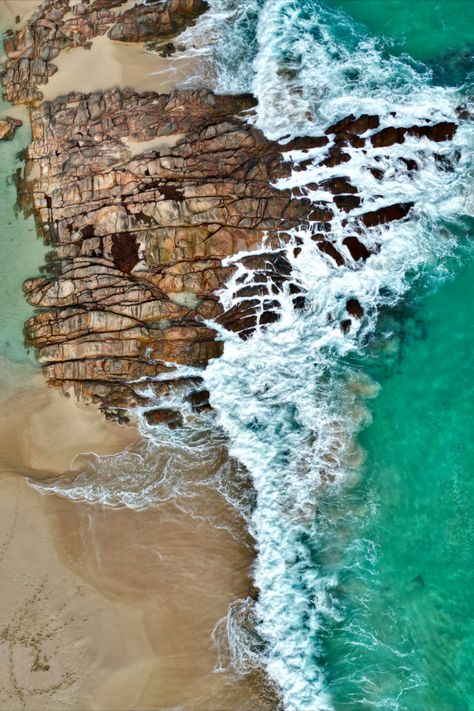 Bring the stunning natural beauty of Western Australia's coastline into your home or office space with our Coastal Erosion Wall Art. This exquisite print captures the awe-inspiring power of the deep blue ocean waves as they collide with the impressive rocks along the rocky shoreline at Injidup Beach, Western Australia. The high-quality image is captured from a bird's-eye perspective, providing a unique and captivating viewpoint of this remarkable coastal landscape. Coastal Erosion, Eye Perspective, Rocky Shoreline, Deep Blue Ocean, View Beach, Ocean Aesthetic, Ocean Rocks, Waves Crashing, Superhero Characters