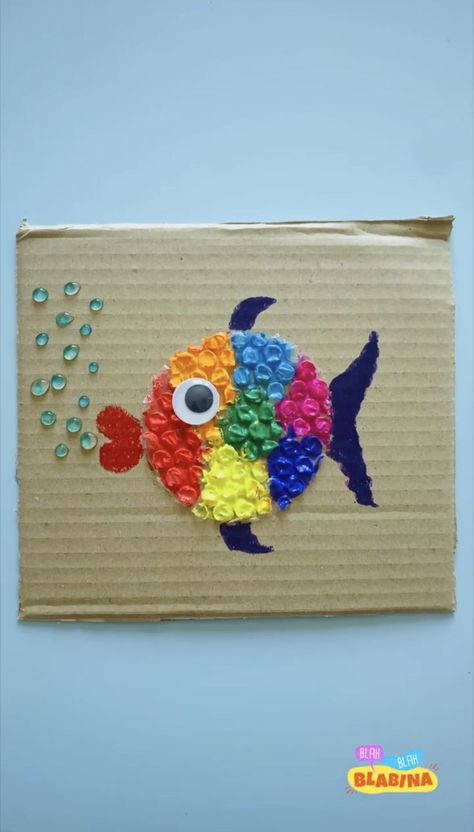 rainbow fish made on a cardboard paper with bubble wrap and paint Fish Crafts Preschool, Bubble Wrap Crafts, Bubble Wrap Art, Rainbow Fish Crafts, Bubble Crafts, Tissue Paper Art, Craft For Preschoolers, Fish Activities, Paint Sticks