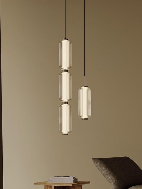 The Elma Linear Pendant Lamp is a sophisticated choice for illuminating any space. Its transparent striped glass cylinder has an airy quality and is anchored by a simple metal fixing at the top and bottom for a perfectly balanced contrast between materials. Create subtle, ambient lighting in any room with Elma. 
 If you have any questions about our products, please contact us and we will reply to you within 24 hours. 
 Product Size 
 S ize: Dia 12cm x H  31 cm /    4.7  x H   12.2  
 
 Size: Dia 12cm x H 60cm /  4.7 x H 23.6 
 
 Size: Dia 12cm x H 94cm /  4.7 x H 37 
 
 Details 
 Material:  Aluminum, Glass. 
 Light source: Integrated LED (LED lights are fully built into the fixture and cannot be replaced). 
 Kelvin range: Warm Light (3000K), Neutral Light (4000K), Cool Light (6000K). 
 Vol Bathroom Pendants, Cylinder Light, Cement Pendant Light, Chandelier Kitchen, Farmhouse Chandeliers, Swag Light, Task Floor Lamp, Glass Cylinder, Kitchen Pendants