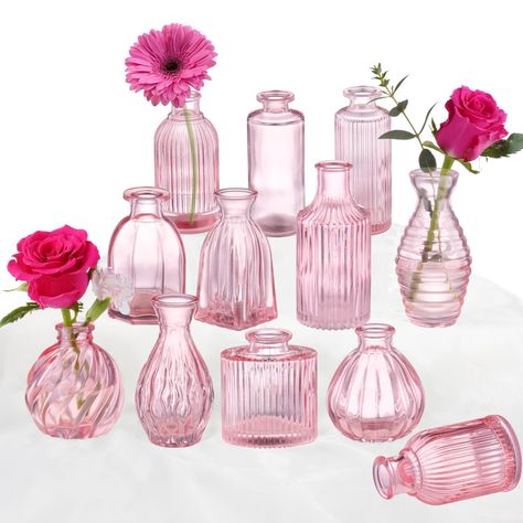 PRICES MAY VARY. 🌸[Pink Glass Vases Set of 12] - The small pink vase in bulk come with 12 different designs of ribbed glass vases for flowers (please refer to the size chart). They are cute bud vases for decor. The pink collections offer a variety for small arrangements, add an extra pretty cute touch to anywhere, especially for wedding centerpieces. 🌸[Unique Ribbed Glass Bud Vases] - The pink flower vase is based on the aesthetic concept of minimalistic ribbed simple stripe design: Less is mo Mason Jars With Pink Flowers, Modern Baby Shower Flowers Theme, Glass Vase With Single Rose, Glass Flower Cvase, Pink Roses Round Vase, Modern Wedding Bud Vases, Wildflower Wedding Vases, Buffet Table Set Up At Home Bridal Shower, Colored Vases Centerpieces