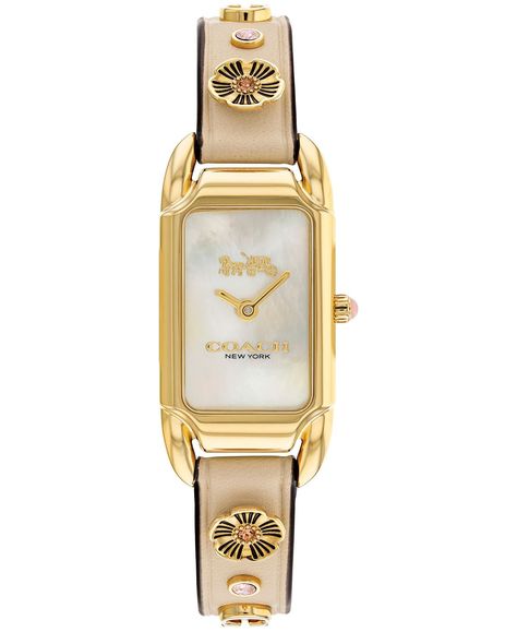 Inspired by the sleek designs of 1920s art deco, the Cadie watch has an elegant long and lean silhouette. Finished with an ivory leather strap featuring the COACH Signature and Tea Rose motif. Style #14504115.Movement - quartzCase - rectangular, gold-tone stainless steel, 17.5mm x 28.5mmStrap - ivory leather strap with tongue button buckleDial - color like mother of pearlWater resistant up to 30 meters2 year limited warranty Horse And Carriage, Leather Strap Watch, Dope Jewelry, Classy Jewelry, Tea Rose, Jewelry Lookbook, Dream Jewelry, Cute Jewelry, Quartz Movement