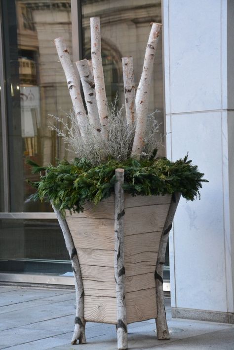 Winter Urn |  Large scale contemporary birch  faux bois concrete planter | Birch poles, white lepto, mixed evergreen Birch Tree Decor, Winter Container Gardening, Christmas Urns, Winter Planter, Tree Theme, Christmas Pots, Christmas Planters, Birch Branches, Winter Porch