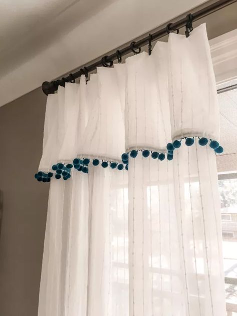 I never really liked the way that the window treatments in our family room looked. They are a basic pair of plain semi-sheer tab top curtains. I figured there must be something I could diy to make them a bit more playful for the kids but also keep the look minimal and relaxing for the adults. I think the folded over ruffle and the cute Pom Pom trim are the perfect touches and add just the right amount of interest to these once plain curtains. For this simple and quick diy all you wil… Ombre Curtains, Tie Up Shades, Check Curtains, Tab Top Curtains, Tab Curtains, Plain Curtains, Drop Cloth Curtains, Pleated Curtains, Diy Curtains