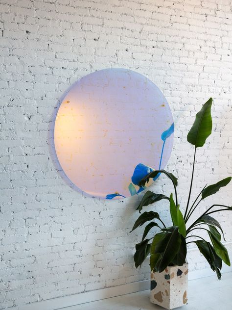 An iridescent mirror hanging on a white brick wall Iridescent Decor, White Brick Wall, Rose Mirror, Wall Brick, Tinted Mirror, Colored Mirror, Big Mirror, Elegant Mirrors, Traditional Mirrors