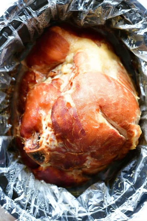 Mom's Famous Bone-In Ham Recipe Bone In Easter Ham, Ham With Bone In Crock Pot, How To Cook Bone In Ham In Crockpot, Ham Bone In Crockpot, Crock Pot Bone In Ham, Crockpot Bone In Ham Recipes, Bone In Ham Crockpot, Bone In Ham Recipes Ovens, Ham In The Crockpot