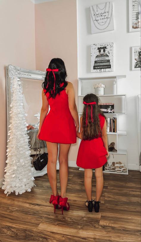 Mother and daughter matching red bows hair clips and red bow heels matching holiday outfits Christmas Photos Mom And Daughter, Mommy And Daughter Christmas Photo Shoot, Mommy Daughter Christmas Photoshoot, Mom And Daughter Christmas Photoshoot, Mom And Daughter Outfits, Mommy Daughter Photoshoot, Red Bow Dress, Daughter Photoshoot, Daughter Outfits