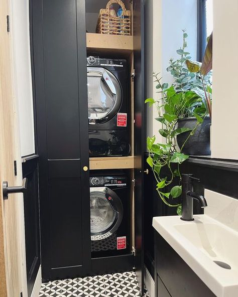 Jodie on Instagram: "WHATS BEHIND THE UTILITY CUPBOARD.. Sneak peek….! To save space, we knew we always wanted to have the washing machine & dryer stacked on top of each other! It also makes it so much easier to load washing! The rest is a large storage shelf at the top and to the side we have a slot for the ironing board! We don’t have a very big utility at all so we had to make the space work as best as possible and it fits everything we need! #utility #utilitystorage #utilityroom #util Washer And Dryer On Top Of Each Other, Washer Dryer On Top Of Each Other, Washing Machine And Tumble Dryer Stacked Cupboard, Washing Machine Cupboard Small Spaces, Stacked Utility Cupboard, Dryer On Top Of Washing Machine, Washing Machine Shelf, Stacked Washing Machine And Dryer, Washing Machine And Dryer Stacked