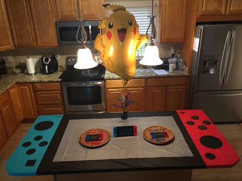 Nintendo switch party table I made. Nintendo Themed Party, Switch Party Decorations, Super Smash Bros Party Decorations, Nintendo Switch Party Decorations, Nintendo Party Decorations, Switch Party Ideas, Kirby Birthday Party Ideas For Boys, Nintendo Birthday Party Ideas, Switch Birthday Party Ideas