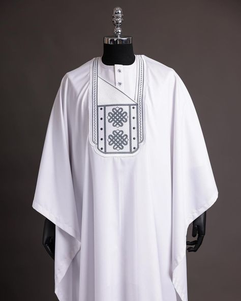 A white agbada, grey embroidery detailing, 3/4 sleeve buba & sokoto - Afrikrea White Agbada Styles Men, Latest Agbada Styles Men, White Agbada Designs, Engagement Outfits For Men, Traditional Mens Wear, Latest Agbada Designs, Agbada Styles Men, Agbada Designs For Men, White Agbada