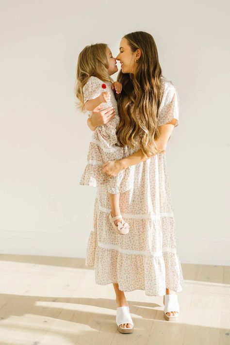 The perfect mommy and me dresses and outfits for you and your littles. Don't settle, our exclusive matching outfits will be your new go-to picks! It's the perfect place to shop for family photo outfits! Mommy And Me Dress, Blush Midi Dress, Clogs Outfits, White Clogs, Feminine Outfits, Beautiful Floral Dresses, Mommy And Me Dresses, Eve Dresses, Ivory Dress