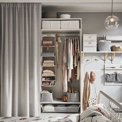 no matter how organized your wardrobe is, sometimes you’ll want your stuff out of sight. If wardrobe doors will stretch your budget too far or you don’t have the space to open them, then try hanging a curtain across your open storage instead. Small Space Wardrobe Ideas, Curtain Wardrobe, Små Rum Lidt Plads, Armoire Ikea, Interior Ikea, Ikea Interior, Small Bedroom Organization, Closet Curtains, Ikea Wardrobe