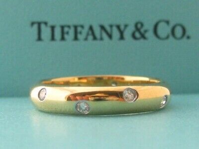 ad eBay - Tiffany & Co. ETOILE Band. TIFFANY & C O. 18K Yellow Gold. Round Brilliant Cut Diamonds. Clarity range VS1. Signed "T & Co." "750" "PT950". Weight 5.3 g. Tiffany Diamond Ring, Tiffany Engagement Ring, Tiffany Rings, Eternity Wedding Ring, Jewelry Lookbook, Fine Rings, Round Brilliant Cut Diamond, Brilliant Cut Diamond, Tiffany & Co.