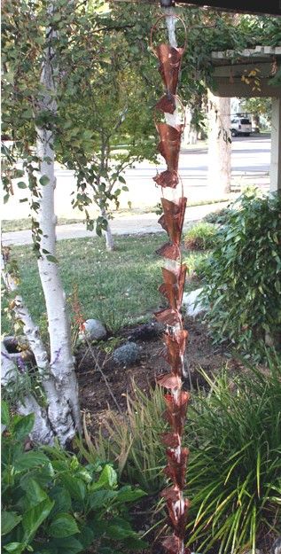 Fish Rain Chain hanging from the roof Copper Rain Chains, Gutter Installation, Copper Gutters, Rain Chains, Paver Tiles, Copper Cups, How To Install Gutters, Rain Art, Water Drip