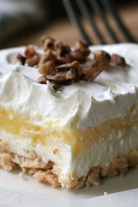 Texas Delight is the easy, layered pudding dessert of your retro dreams. Find out why this food editor and so many of our Allrecipes community members love it, and learn how to make it at home. Moms Texas Delight Recipe, 4 Layer Dessert Recipes, 4 Layer Pudding Dessert, Three Layer Dessert, Layered Pudding Cake, Layered Custard Dessert, 5 Layer Dessert, Pudding Layered Desserts, Texas Yum Yum Pie