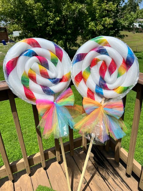 Currently on vacation so I won't be getting any packages out until Sept 30! Listing is for one Single Rainbow Lollipop with single stripe. 46" x 16-18" all weatherproof foam lollipops. These will last several years through rain and snow! (See photos for lollipops in snow and lollipops with lights attached).  I ship each lollipop with two size sticks. I'm able to save a little bit of room by having a placeholder stick instead of the full size one. just switch them out when it arrives. or you can Dollar Tree Rainbow Party, Lollipop Outdoor Decorations, Lollipop Yard Decorations Diy, Dollar Tree Candyland Diy, Diy Outdoor Candyland Decorations, Winter Candy Land Christmas Decorations, Giant Christmas Candy Decorations, Candyland Pep Rally, Candy Bedroom Theme