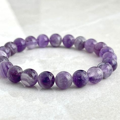 Amethyst Bracelet Available at Mirani Agate Contact on +918200039627 or Click here :- https://wa.me/918200039627 #amethyst #amethystjewelry #amethystcrystal #amethyststone #amethystgemstone #amethystbracelet #amethystbeads #bracelet #braceletstacks #braceletlover #braceletsoftheday #explorepage #trending #explore Amethyst Beaded Bracelet, Shambala Bracelet, Amethyst Bracelet Beads, Stretchy Beaded Bracelet, Slide Bracelet, Chevron Amethyst, Energy Bracelets, Crystal Healing Bracelets, Crystal Beads Bracelet