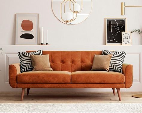 Orange velvet sofa