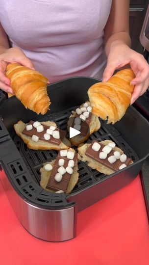 How did I not know this s'mores trick! 😍 (Easy Dessert) | How did I not know this s'mores trick! (Easy Dessert) 
I make s'mores sandwhiches using croissants

This original video was produced by Network Media and... | By My Life | Marshmallows on top of your
chocolate. Just do just a couple. You don't need that
much. You place the top of your croissants right on top just
like that Right and it's ready to go inside your air fryer.
I'm going to air fry this for five minutes at 350. Super
quick and easy dessert in the air fryer. So you only actually
need to leave your s'mores in there for a couple minutes.
Maybe about 2 minutes. It's perfect enough for a tropic to
get melted. And look at that. Your croissants are nice and
toasty. Ah. Who needs a cracker when you have a croissant
s'more sandwi Smore Croissants, Air Fryer Smores Recipes, Smores Croissant, Dessert Ideas Easy, Back To School Recipes, Cooking Desserts, Hersheys Chocolate, Smore Recipes, Mini Croissants