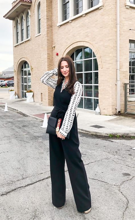 Creative Layering for Your Basic Black Jumpsuit | #jumpsuit #jumpsuitsrompers #blackjumpsuit #vincecamuto #layered #layering #howtowear #howtostyle #70sfashion #vintagestyle #retrofashion #outfitinspiration #datenightoutfit #winterfashion #springfashion #transitional Jumpsuit Outfit Professional, Layered Jumpsuit Outfit Fall, Jumpsuit Office Outfit, Layering A Jumpsuit, Black Jumpsuit Winter Outfit, Styling Black Jumpsuit, Jumpsuit Layering Outfit, Layering Jumpsuit Outfit, Layering Jumpsuit